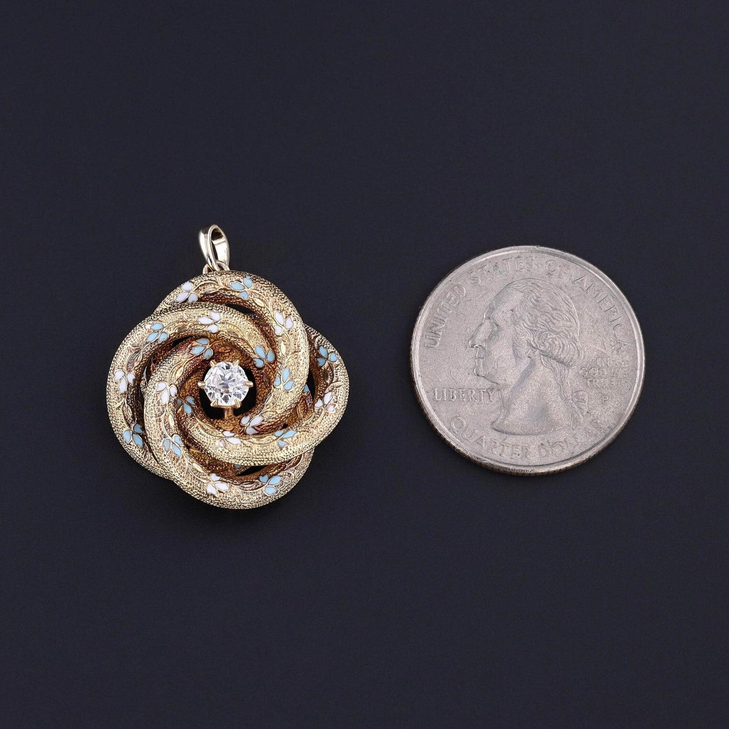 Antique Diamond Love Knot Pendant of 14k Gold